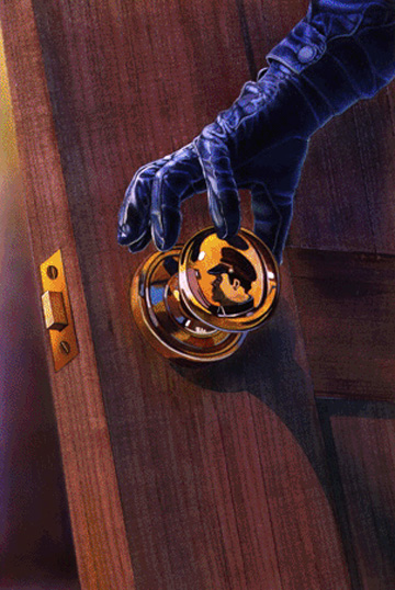 Hand holding a circular decorative medallion
